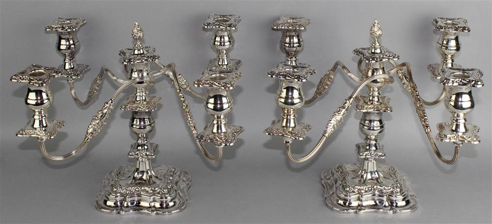 Appraisal: PAIR OF GEORGE III STYLE FIVE LIGHT SILVERPLATED CANDELABRA with