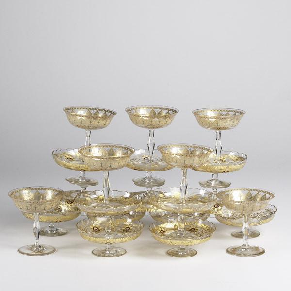 Appraisal: MOSER STYLE Gilt decorated glass includes twelve matching compotes together