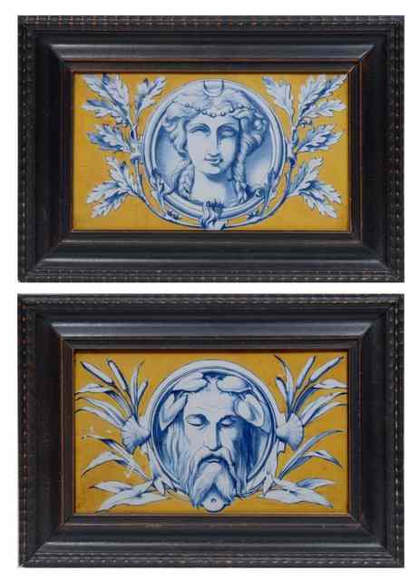 Appraisal: A PAIR OF PAINTED RECTANGULAR TILES with mask heads and