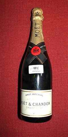 Appraisal: A BOTTLE OF MOET AND CHANDON CHAMPAGNE six bottles of