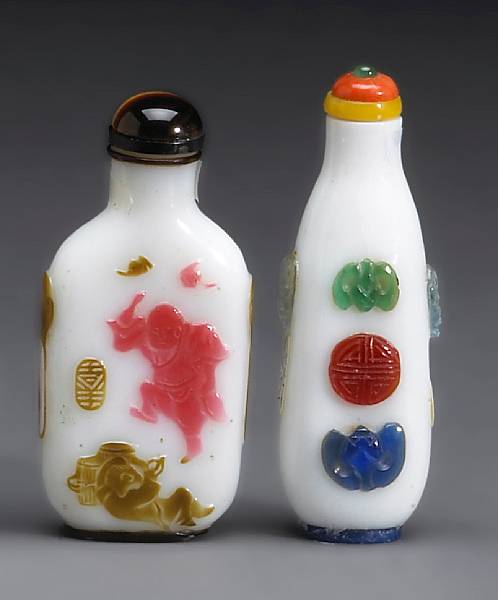 Appraisal: Two colored glass overlay white milk glass snuff bottles Late