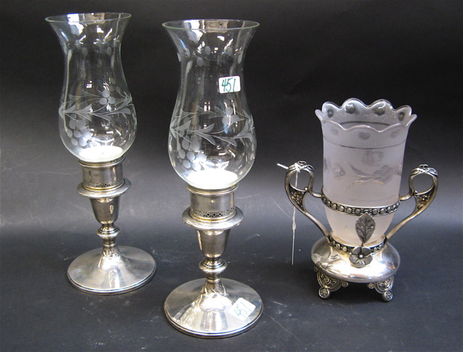 Appraisal: AMERICAN VICTORIAN SPOONER PAIR CANDLE LAMPS pieces The footed spooner