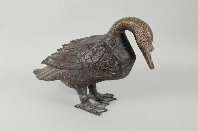 Appraisal: Asian Patinated Bronze Duck Asian patinated bronze duck high long