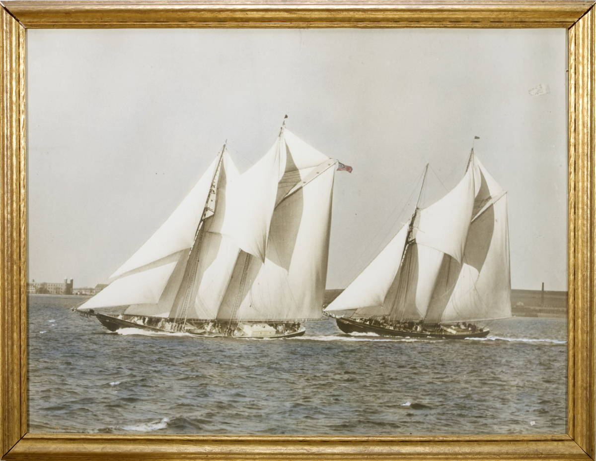 Appraisal: LARGE FRAMED PHOTOGRAPH OF THE SCHOONERS quot COLUMBIA quot AND