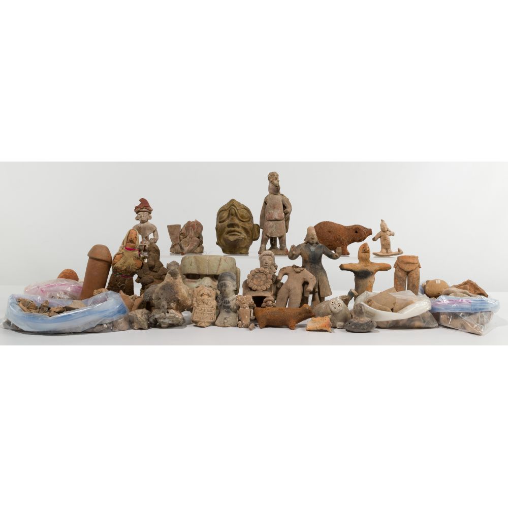 Appraisal: PRE-COLUMBIAN STYLE FIGURINE AND FRAGMENT ASSORTMENTOver pounds of figures and