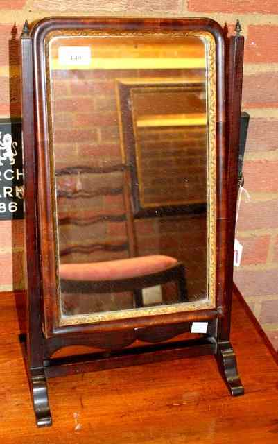 Appraisal: A GEORGE III MAHOGANY SWING TOILET MIRROR with rectangular mirror