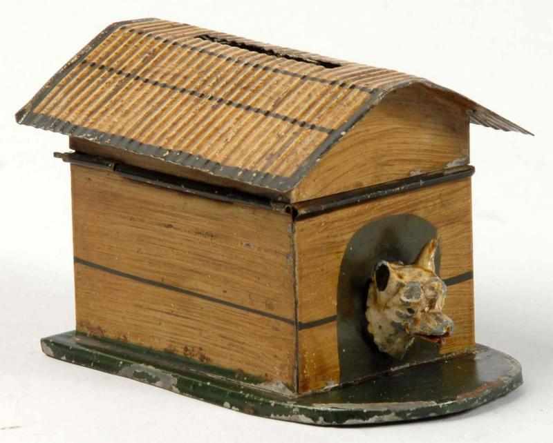 Appraisal: Tin German Dog in Dog House Still Bank Description Includes