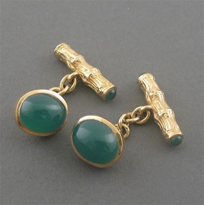 Appraisal: A pair of green chalcedony mounted ct gold cuff links