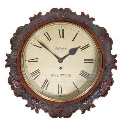 Appraisal: A VICTORIAN WALNUT AND MAHOGANY DIAL CLOCK with shaped and