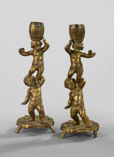 Appraisal: Unusual Pair of Continental Gilt-Brass Figural Candlesticks fourth quarter th