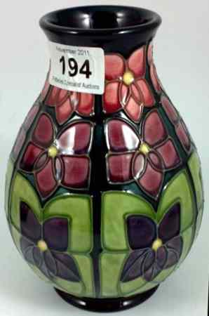 Appraisal: Moorcroft Vase Decorated with Violets Discontinued Sally Tuffin height cm