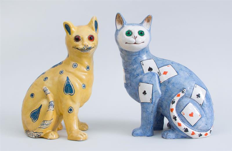 Appraisal: TWO SIMILAR PAINTED POTTERY FIGURES OF SEATED CATS IN THE