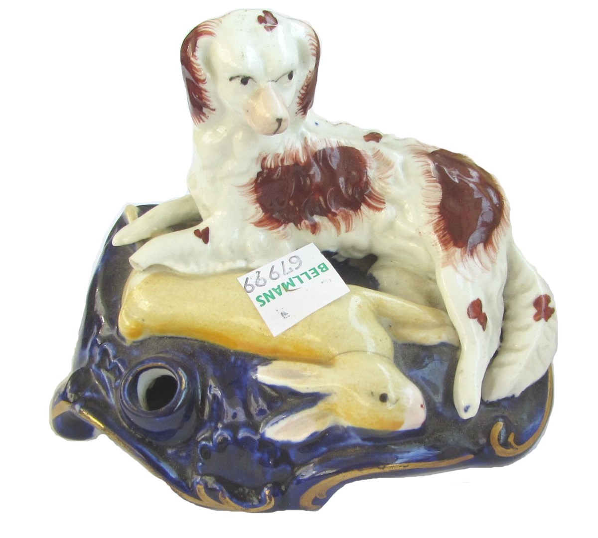 Appraisal: A Staffordshire spaniel and hare inkwell circa a Staffordshire poodle