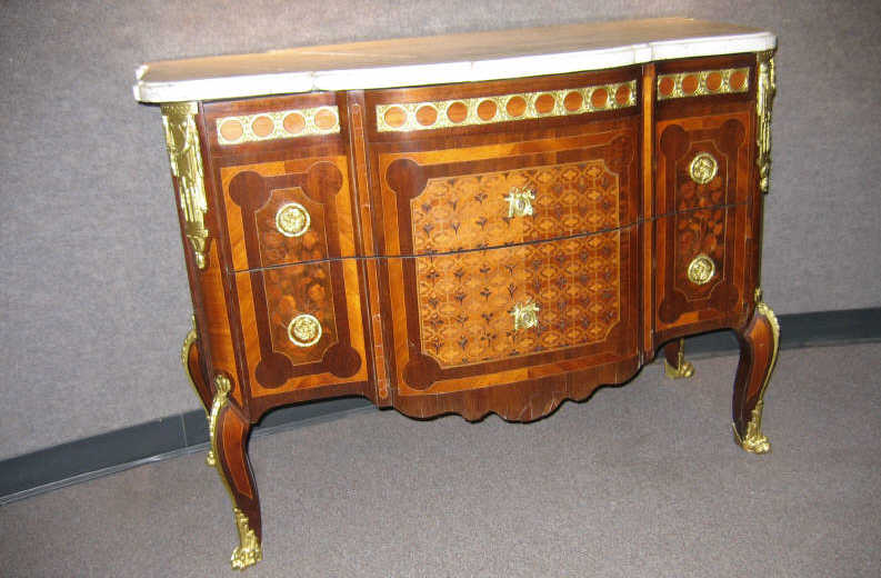 Appraisal: LOUIS XV XVI ORMOLU AND FRUITWOOD COMMODE Having a shaped