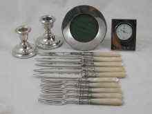 Appraisal: A mixed lot comprising a pair of silver candle sticks