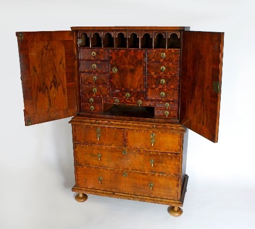 Appraisal: An early th Century walnut cabinet on chest the top