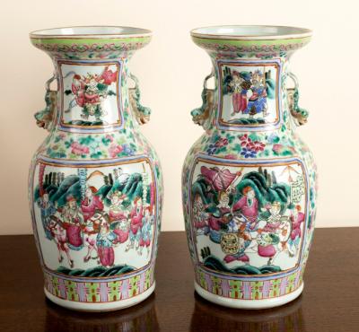 Appraisal: A pair of th Century Canton famille rose vases painted