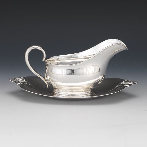 Appraisal: INTERNATIONAL STERLING SILVER GRAVY BOAT AND UNDERPALTE ROYAL DANISH PATTERN