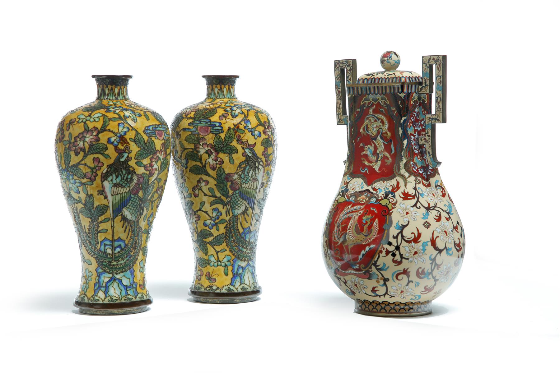 Appraisal: THREE ASIAN CLOISONNE VASES Twentieth century Pair with flowers on