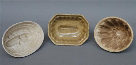 Appraisal: GROUP THREE ANTIQUE CERAMIC MOLDS Various shapes and sizes Tallest