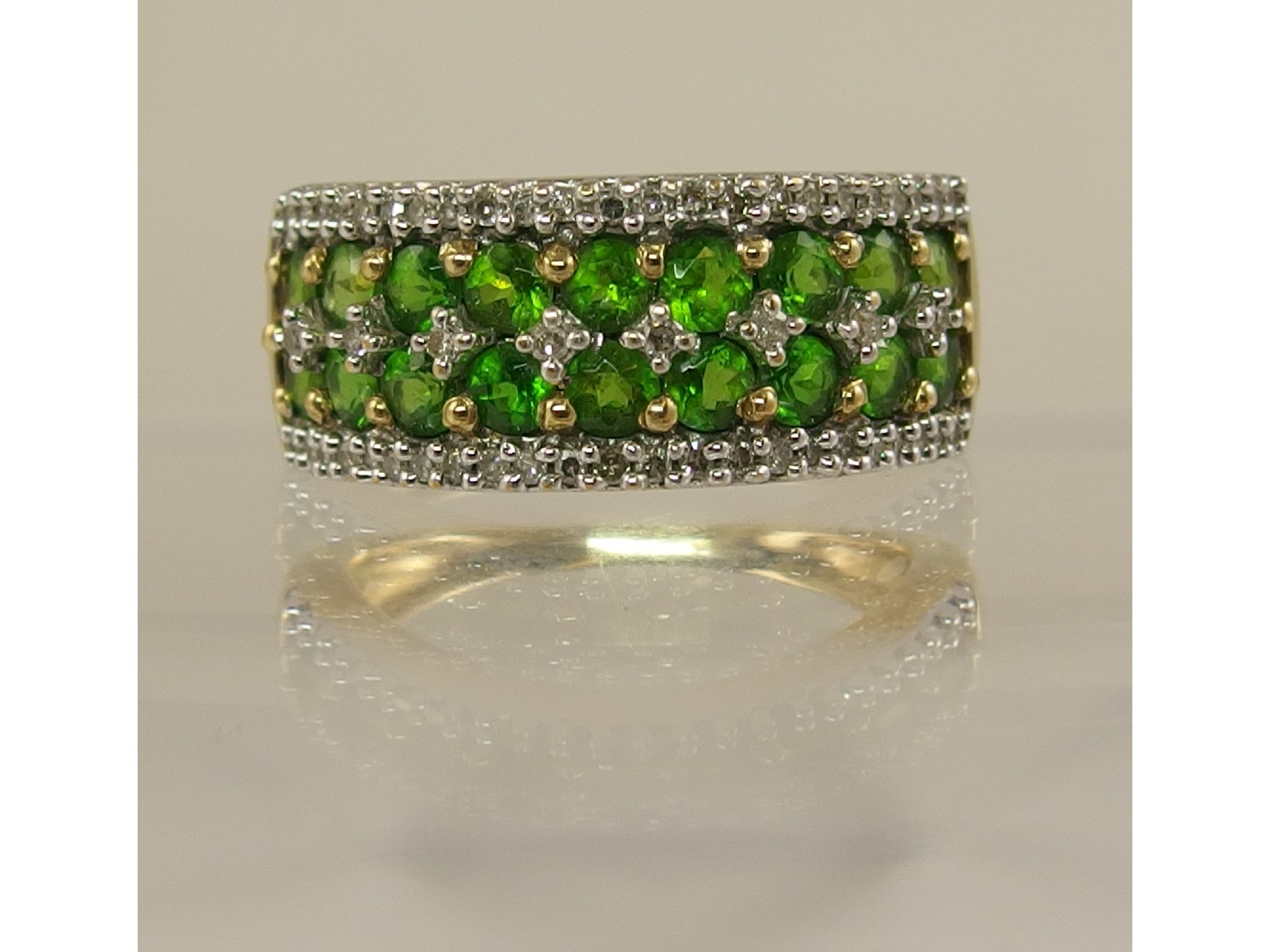 Appraisal: A ct gold diopside garnet and diamond ring