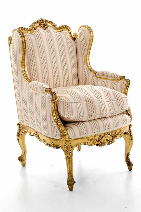 Appraisal: Louis XV style carved giltwood armchair late th century carved