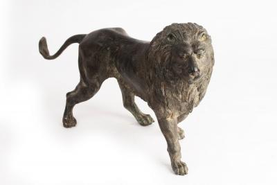 Appraisal: A bronze figure of a standing lion cm long