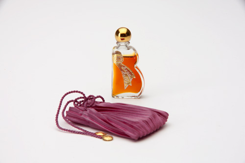 Appraisal: BOURJOIS Beau Belle mini perfume bottle in clear glass with