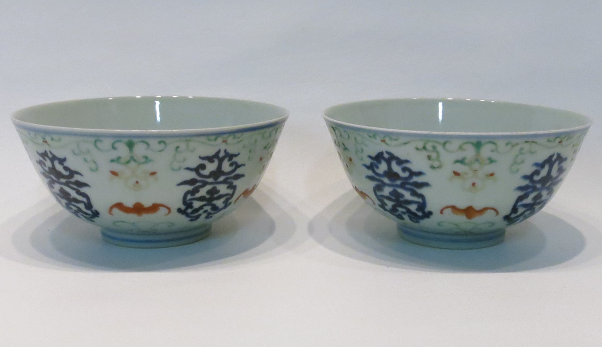 Appraisal: TWO CHINESE PORCELAIN BOWLS with hand painted exteriors the underfoot