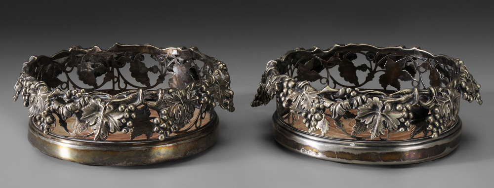 Appraisal: Pair Silver-Plated Wine Coasters English late th early th century