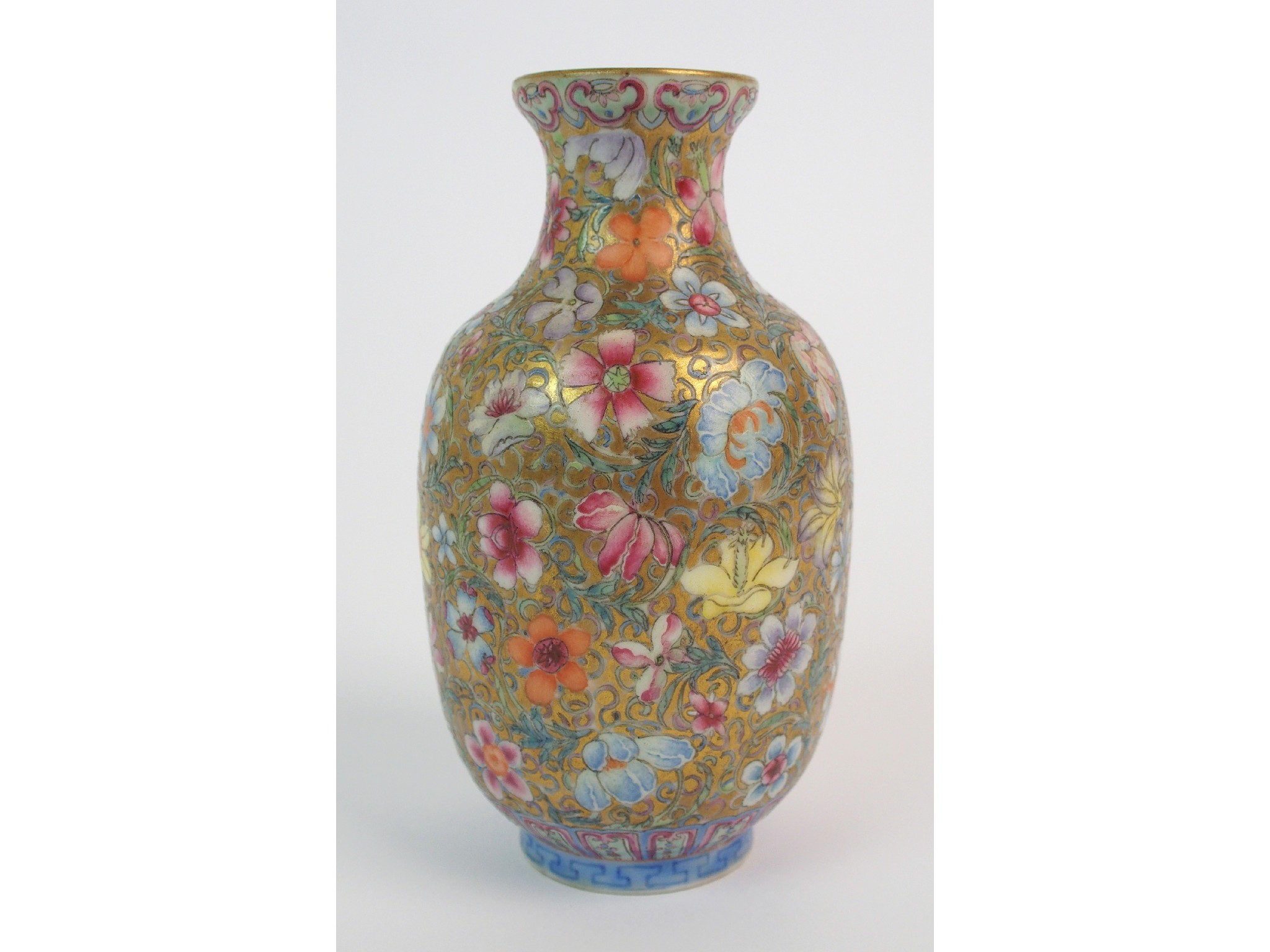 Appraisal: A Chinese eggshell baluster vasepainted all over with flowers on