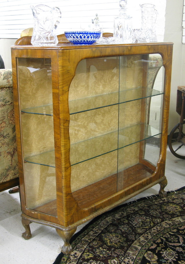 Appraisal: GLASS AND WALNUT CHINA DISPLAY CABINET Chippendale Revival style English