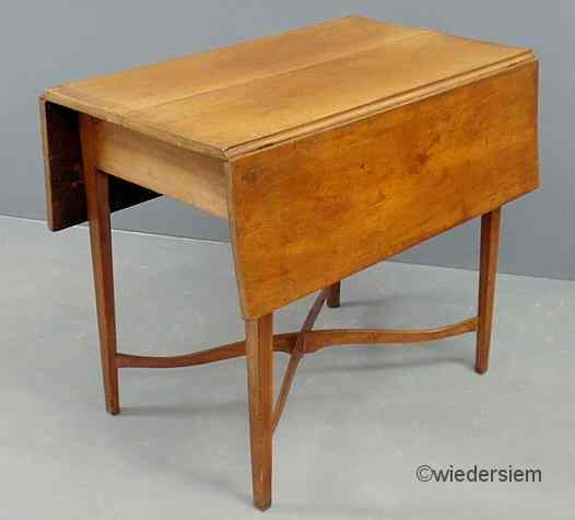 Appraisal: Cherry Pembroke table c with square tapered legs all joined