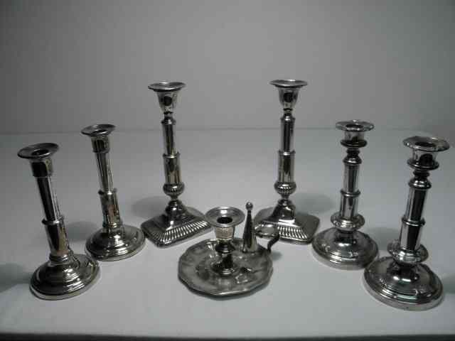 Appraisal: Collection of assorted early silver plated candlesticks and a chamberstick