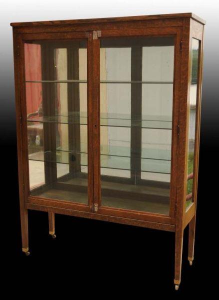 Appraisal: Oak China Electric Display Cabinet Description Circa Includes three glass