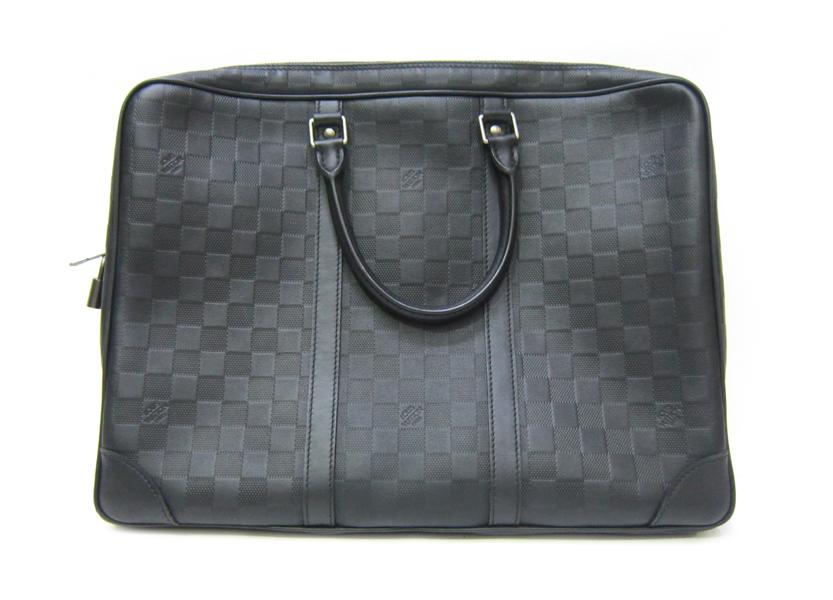 Appraisal: A LOUIS VUITTON SOFT BREIFCASE IN DAMIER CARBONE CANVAS A