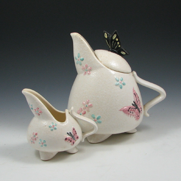 Appraisal: Hull Butterfly - Teapot Creamer Bowl Three Hull Butterfly pebble