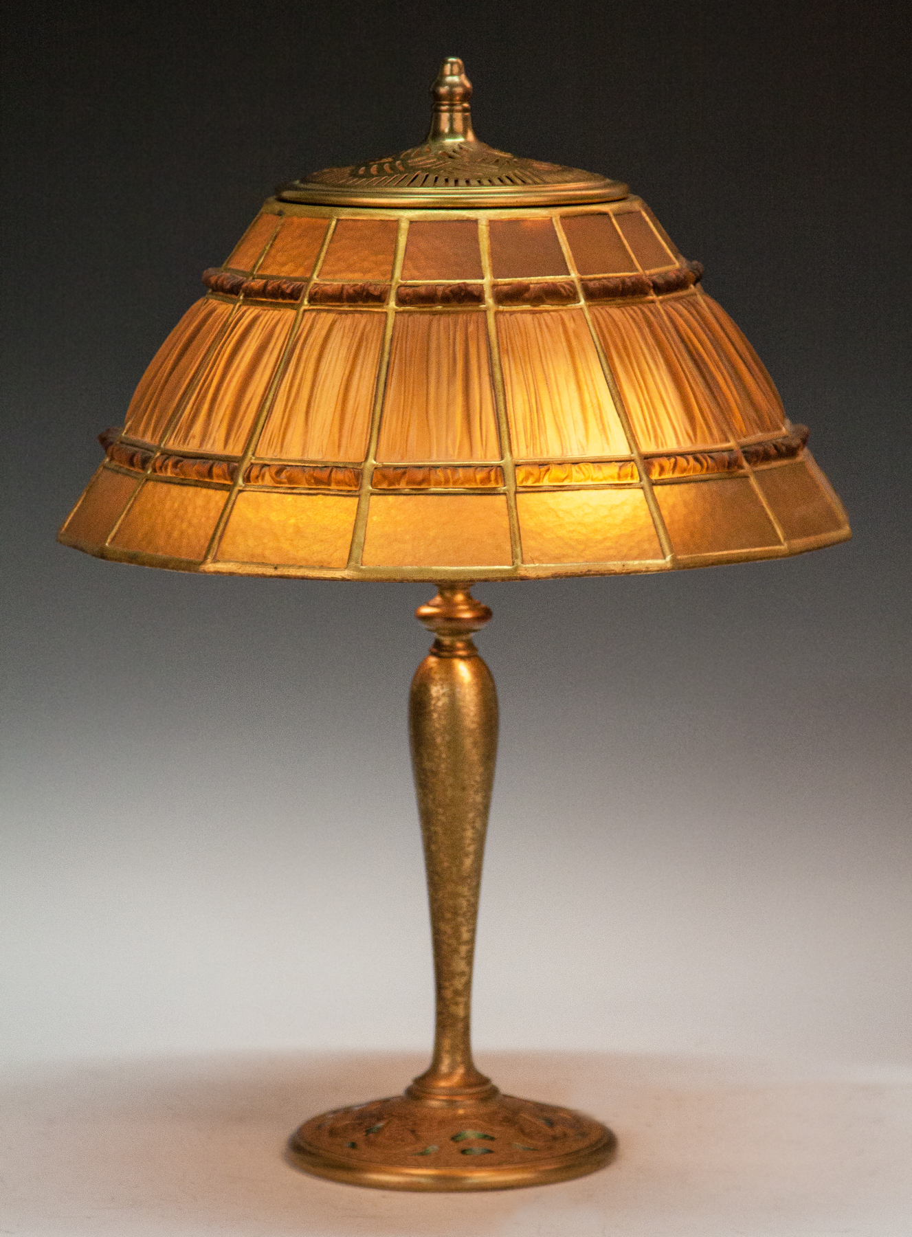 Appraisal: Fine Tiffany Studios Linenfold Table Lamp Gilt bronze glass with