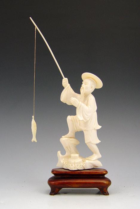 Appraisal: CHINESE CARVED IVORY FIGURE OF A FISHERMAN Figure of man