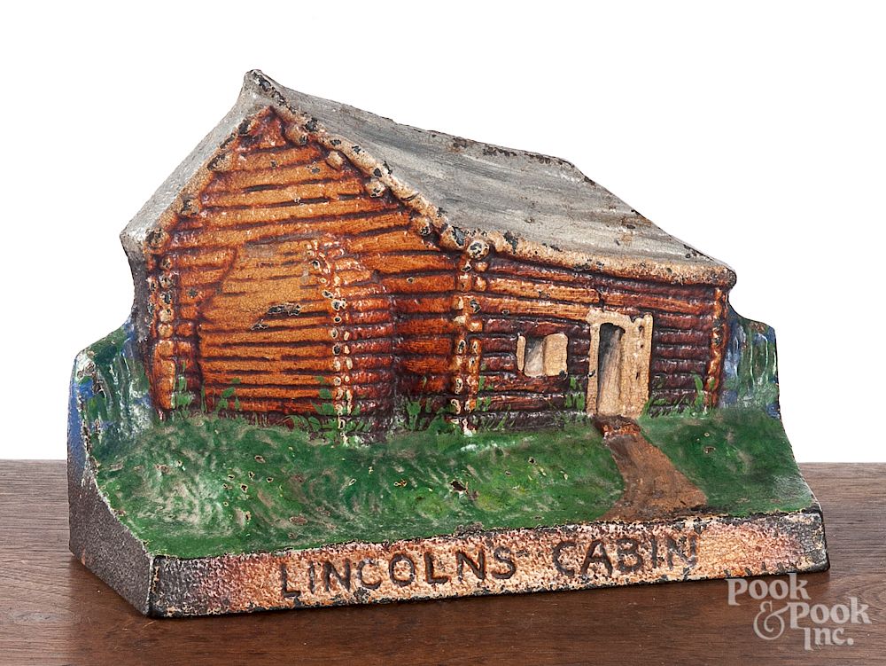 Appraisal: Cast iron Lincoln's Cabin doorstop Cast iron Lincoln's Cabin doorstop