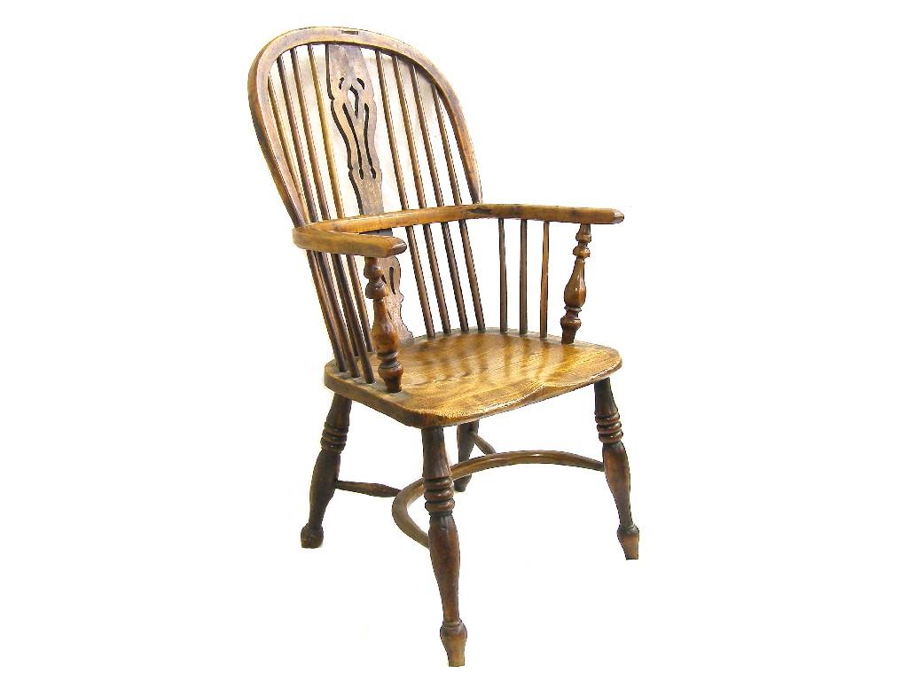 Appraisal: th century Windsor armchair the spindle back with pierced vase