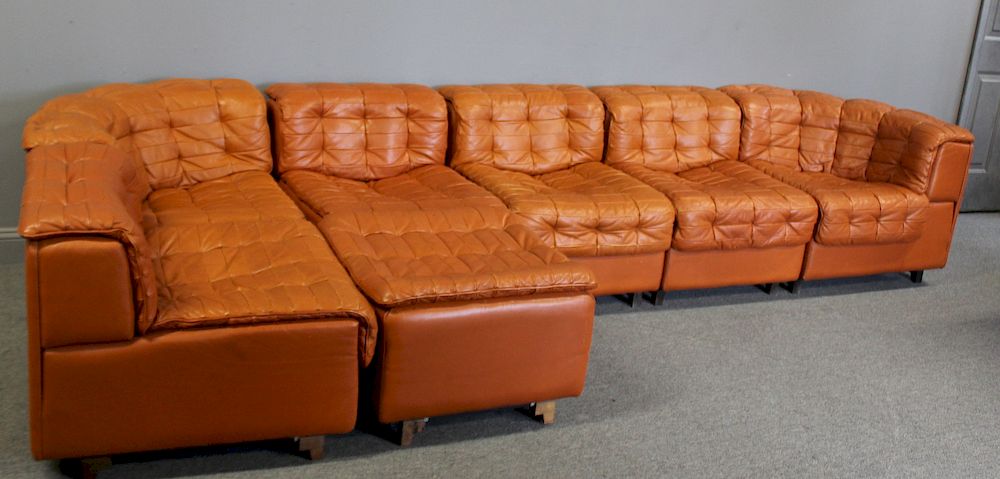 Appraisal: DE SEDE Leather Sectional Sofa and Ottoman Comprising of sections