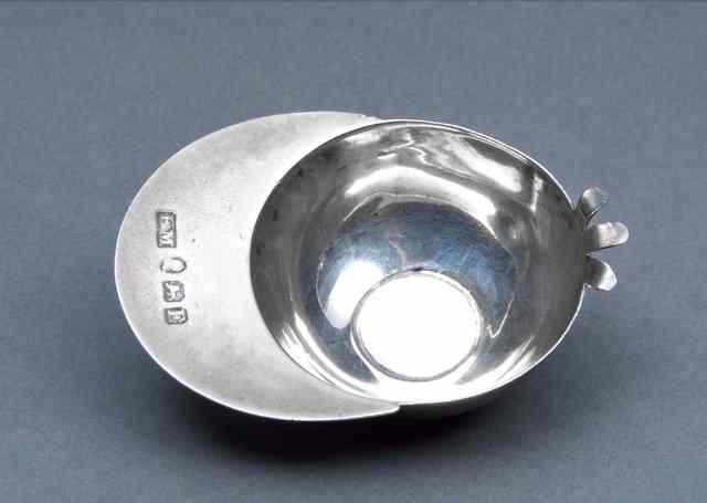 Appraisal: A GEORGE III SILVER CADDY SPOON in the form of