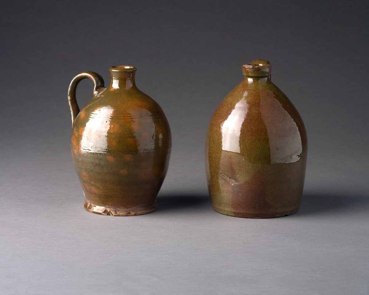 Appraisal: TWO NEW ENGLAND REDWARE JUGS ONE OF OVOID FORM Height