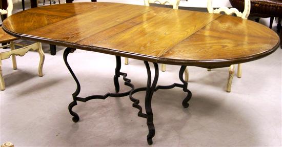 Appraisal: Dining table iron base with reverse curves and oval oak