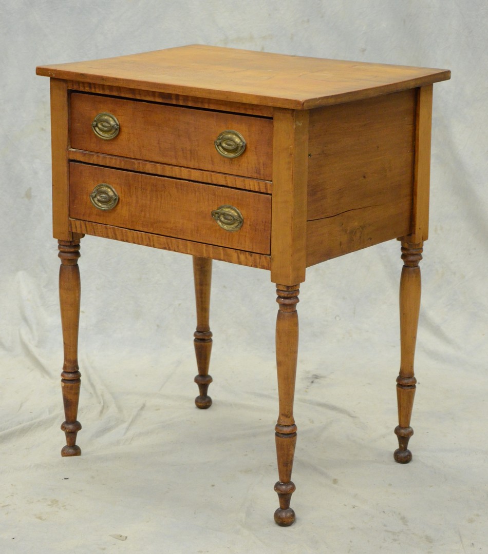 Appraisal: Figured maple drawer Sheraton stand turned legs early oval brasses