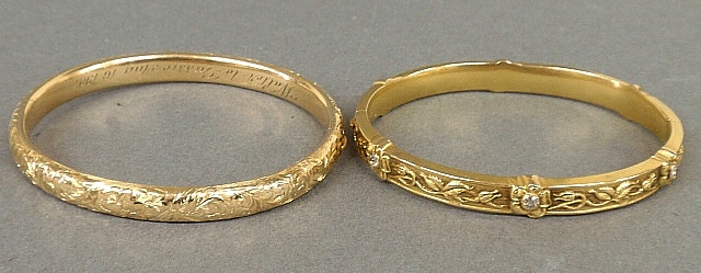 Appraisal: - Two gold bangle bracelets one tested k dated with