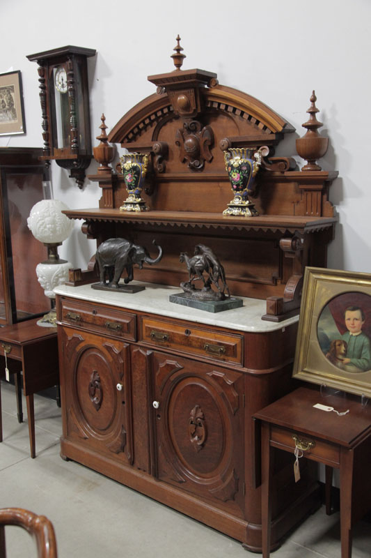 Appraisal: VICTORIAN MARBLE TOP SERVER Walnut having a large carved gallery