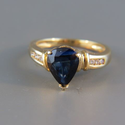 Appraisal: Sapphire Diamond Ring deep blue pear shape gem weighing carats