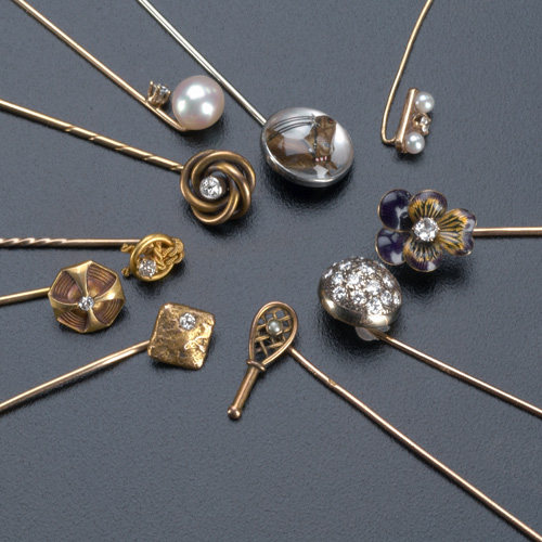 Appraisal: Ten gold stick pins some with diamonds pearls and enamel